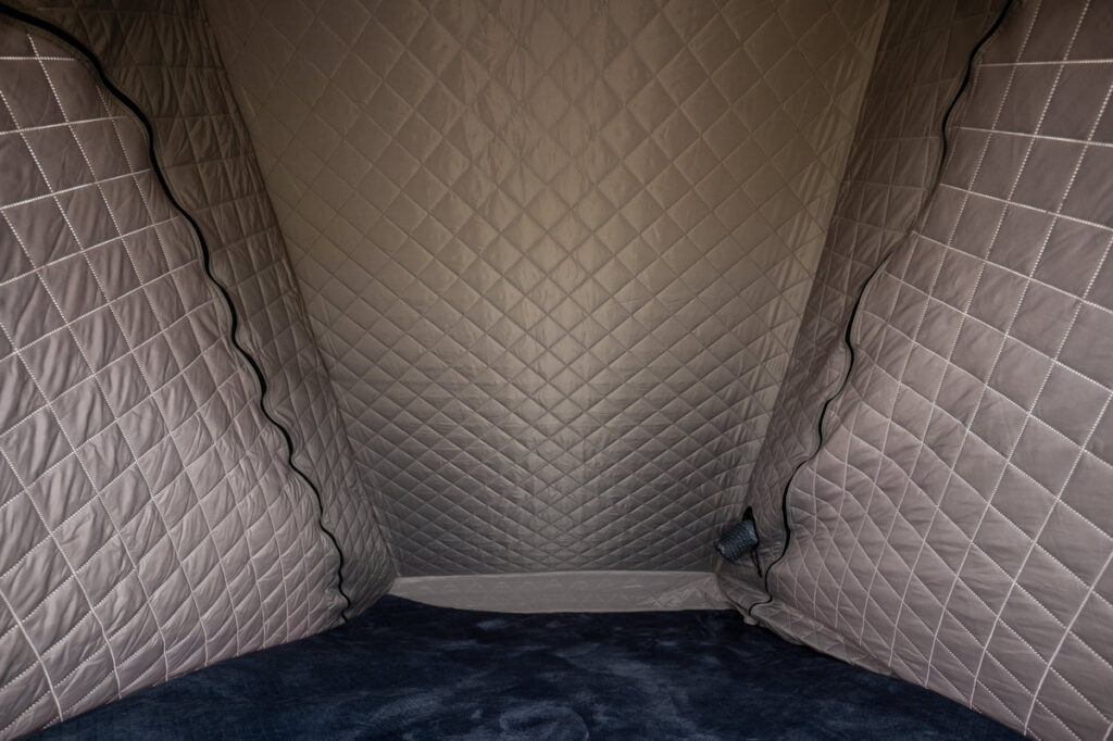 Quilted thermal insulation liner fitted inside a TOPOAK rooftop tent
